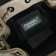 Chanel small drawstring bucket bag in black lambskin | A93730  - 6