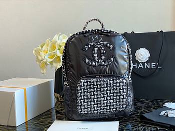 Chanel black shiny skin with tweed backpack