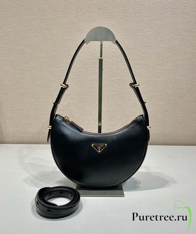 PRADA | Arqué leather shoulder bag in black - 1