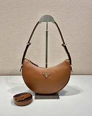PRADA | Arqué leather shoulder bag in brown - 1