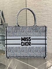 DIOR | Medium Dior Book Tote Pale Blue and Black Miss Dior Allover Embroidery - 1