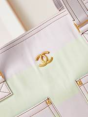 CHANEL | Shopping bag Printed denim & gold-tone metal light pink, yellow, blue  - 6