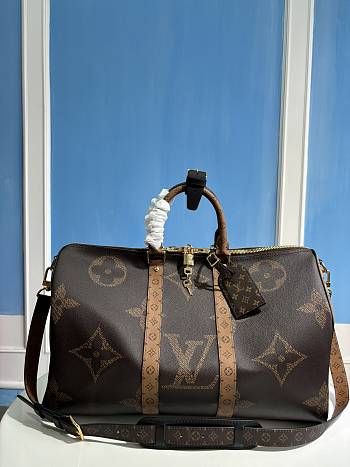 LOUIS VUITTON | Keepall Bandoulière 45 Monogram Giant Canvas