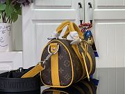 LOUIS VUITTON | Keepall Bandoulière 25 Safran Yellow  - 4