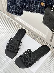 LOEWE | Petal Anagram slide in soft calfskin in black - 1