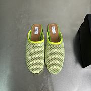 ALAIA | Flat-soled half-slippers in green - 2
