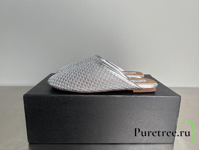 ALAIA | Flat-soled half-slippers in gray - 1