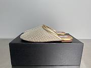 ALAIA | Flat-soled half-slippers in gold - 1