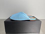ALAIA | Flat-soled half-slippers in blue - 1