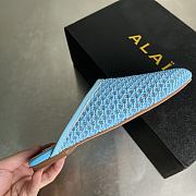 ALAIA | Flat-soled half-slippers in blue - 6