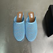 ALAIA | Flat-soled half-slippers in blue - 5