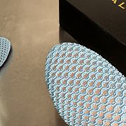 ALAIA | Flat-soled half-slippers in blue - 2