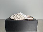 ALAIA | Flat-soled half-slippers in white - 1