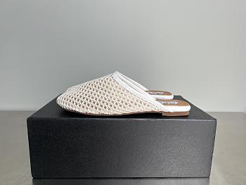 ALAIA | Flat-soled half-slippers in white