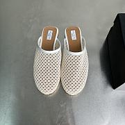 ALAIA | Flat-soled half-slippers in white - 5
