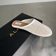 ALAIA | Flat-soled half-slippers in white - 3