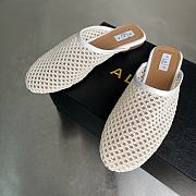 ALAIA | Flat-soled half-slippers in white - 2