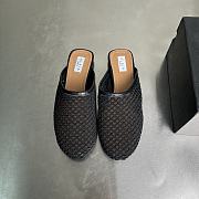 ALAIA | Flat-soled half-slippers in black - 5