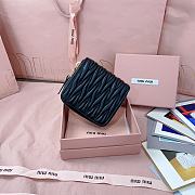 MIUMIU | Quilted effect leather wallet in black - 3
