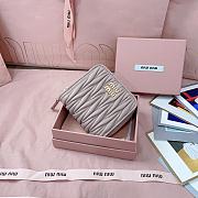 MIUMIU | Quilted effect leather wallet in light pink - 1