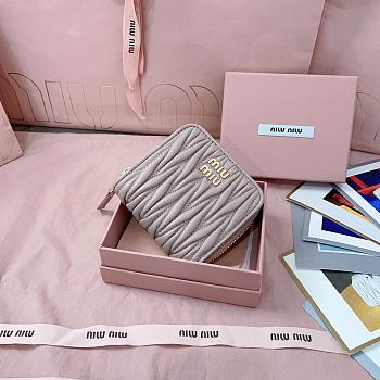 MIUMIU | Quilted effect leather wallet in light pink
