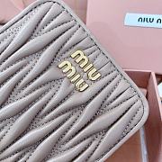 MIUMIU | Quilted effect leather wallet in light pink - 4