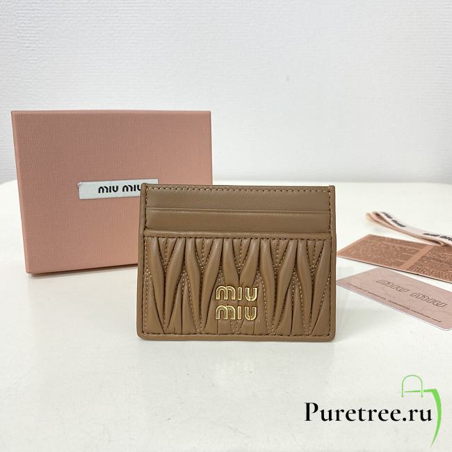 MIUMIU | Matelassé nappa leather card holder in brown - 1