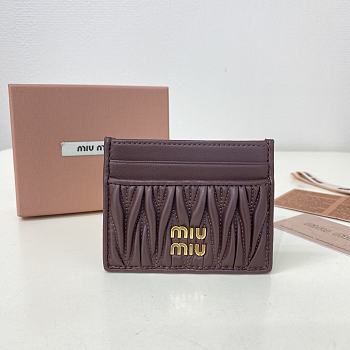 MIUMIU | Matelassé nappa leather card holder in burgundy