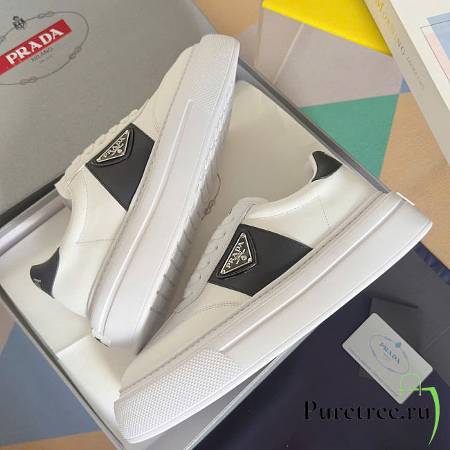 PRADA | Perforated leather sneakers In White - 1