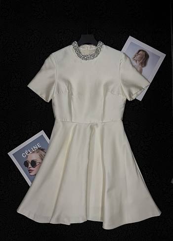 Chanel waist-cinching dress in beige